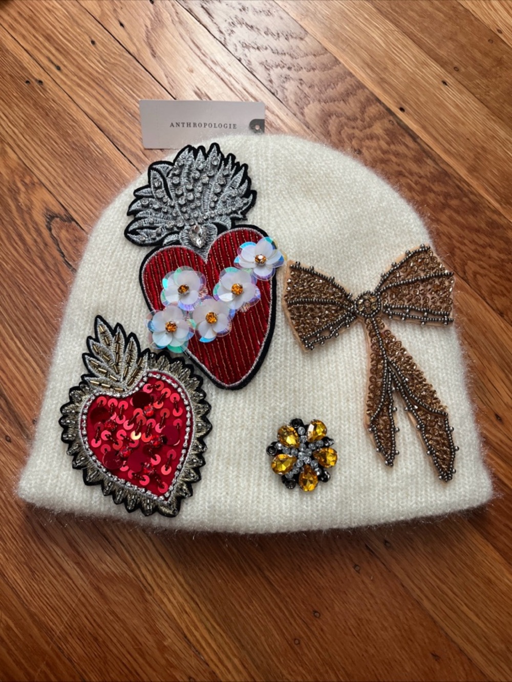 Anthropologie Ivory Knit Beanie with Red Heart and Silver Embellishments